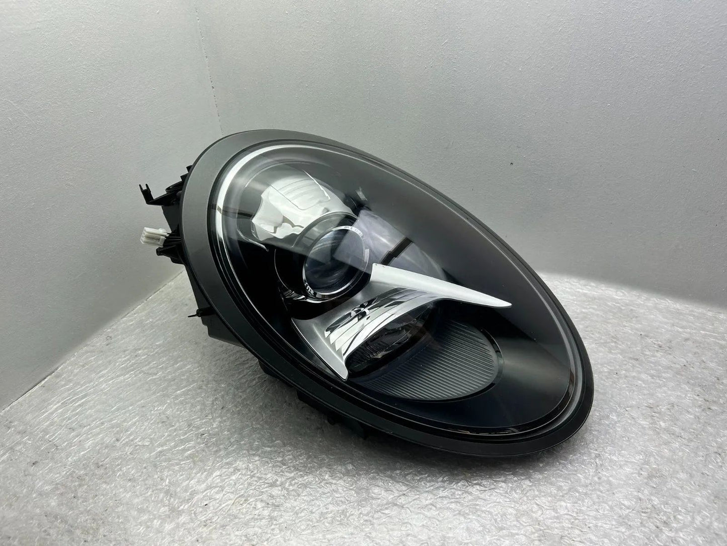 Porsche 911 991 Xenon Scheinwerfer links Kurvenlicht 99163113211