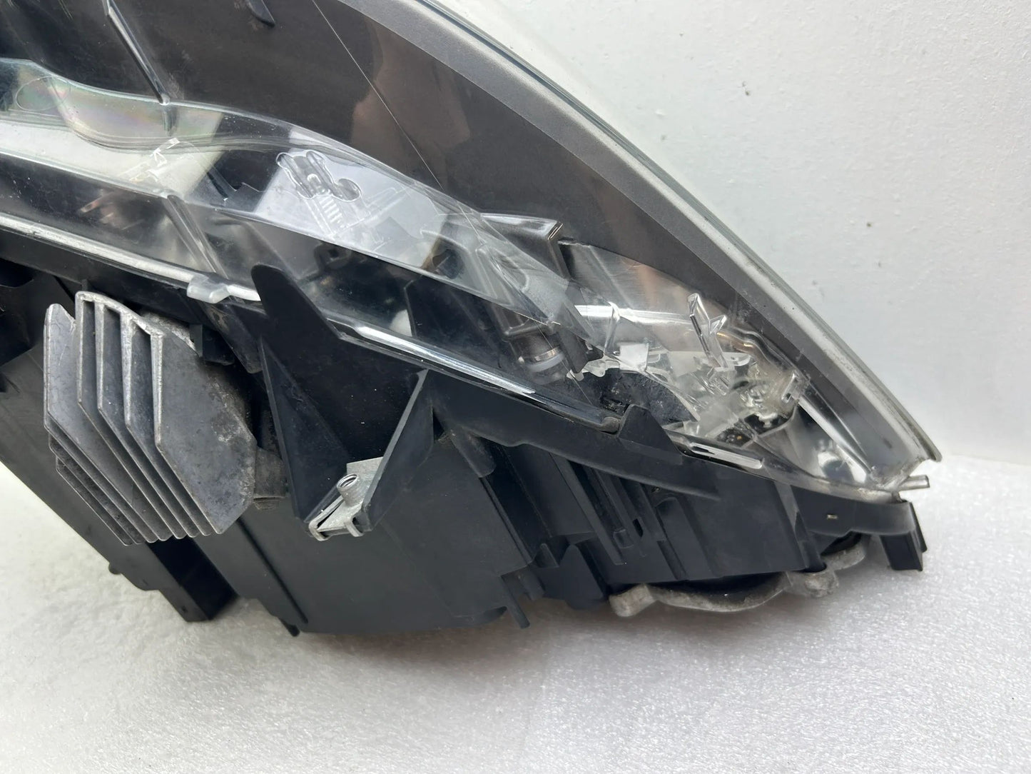 BMW 5er F10 F11 Xenon Kurvenlicht Scheinwerfer links 7203251