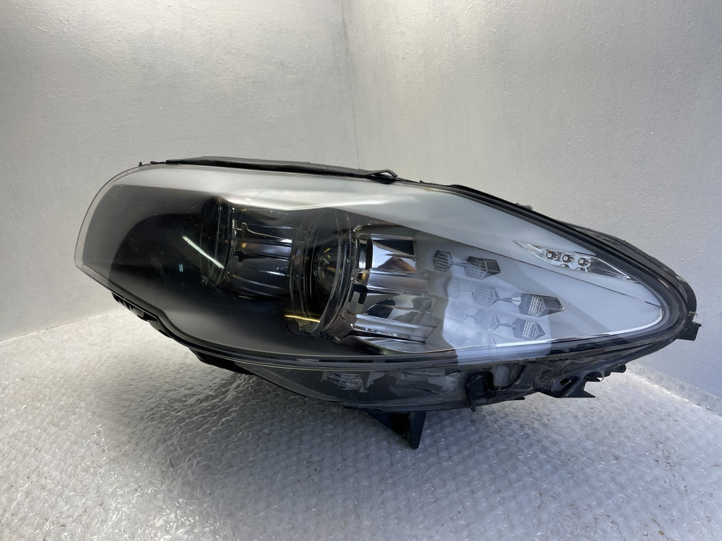 Original BMW 5er F10 F11 Xenon Scheinwerfer links 72032451