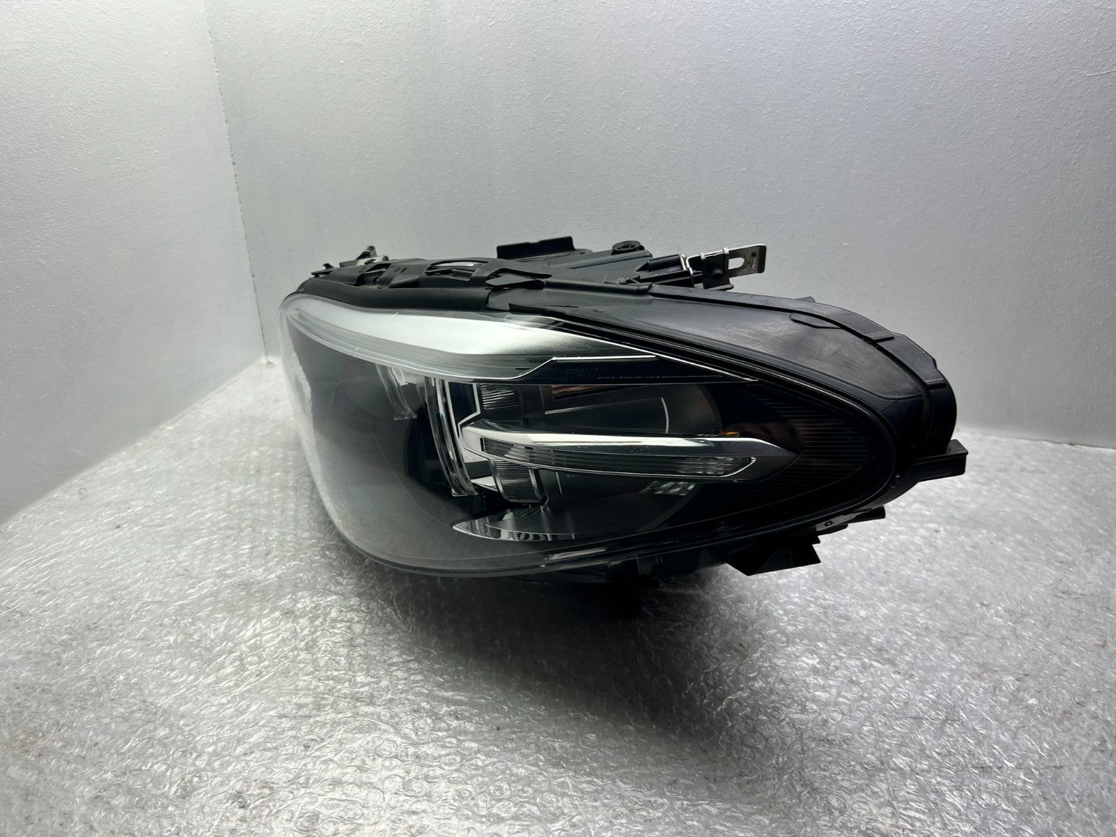 Original BMW 5er F10 F11 LCI Xenon Scheinwerfer links Kurvenlicht 74606012