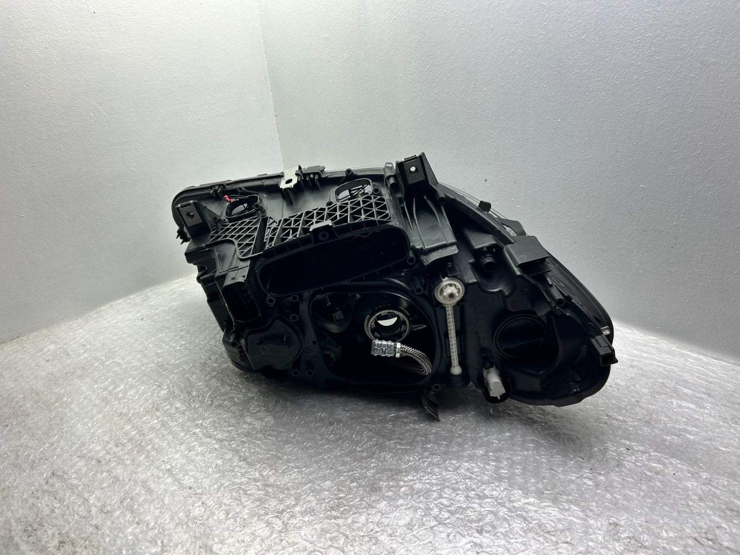 Original BMW 5er F10 F11 LCI Xenon Scheinwerfer links Kurvenlicht 74606017