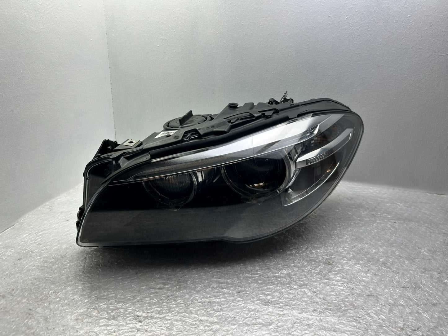 Original BMW 5er F10 F11 LCI Xenon Scheinwerfer links Kurvenlicht 74606011