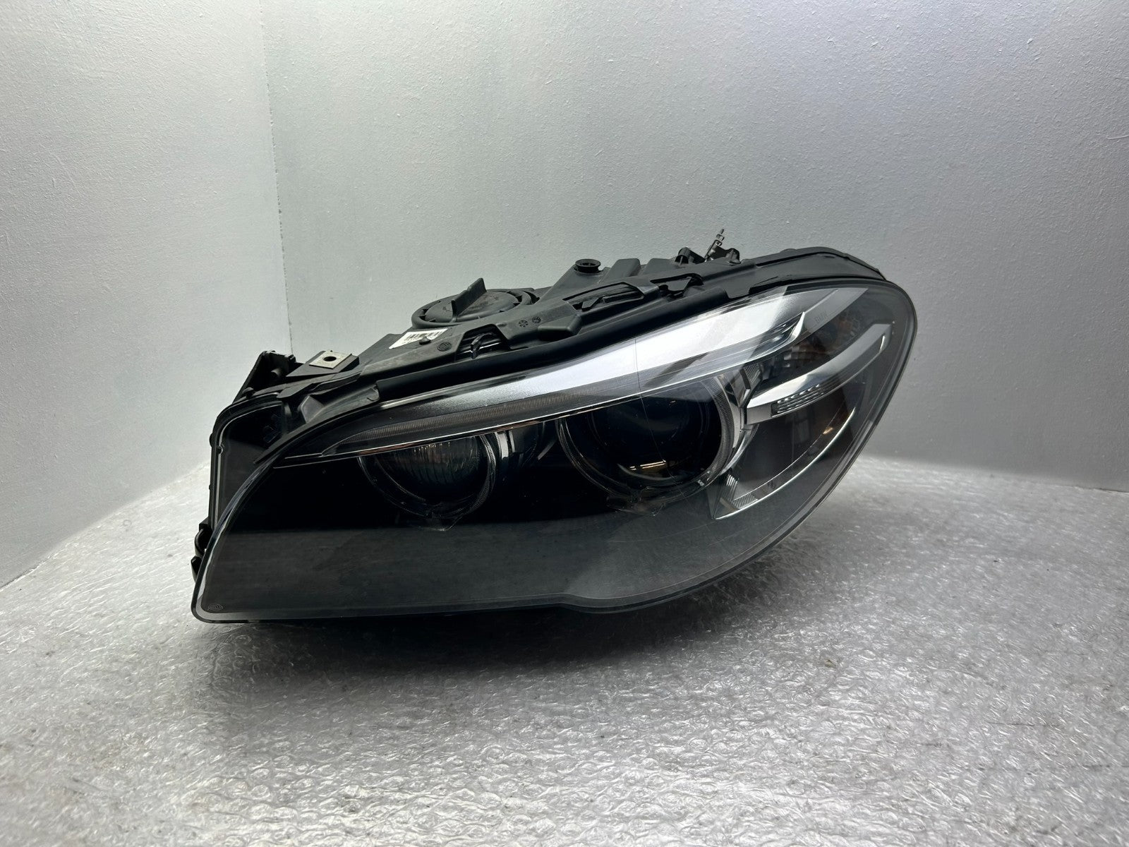 Original BMW 5er F10 F11 LCI Xenon Scheinwerfer links Kurvenlicht 74606011