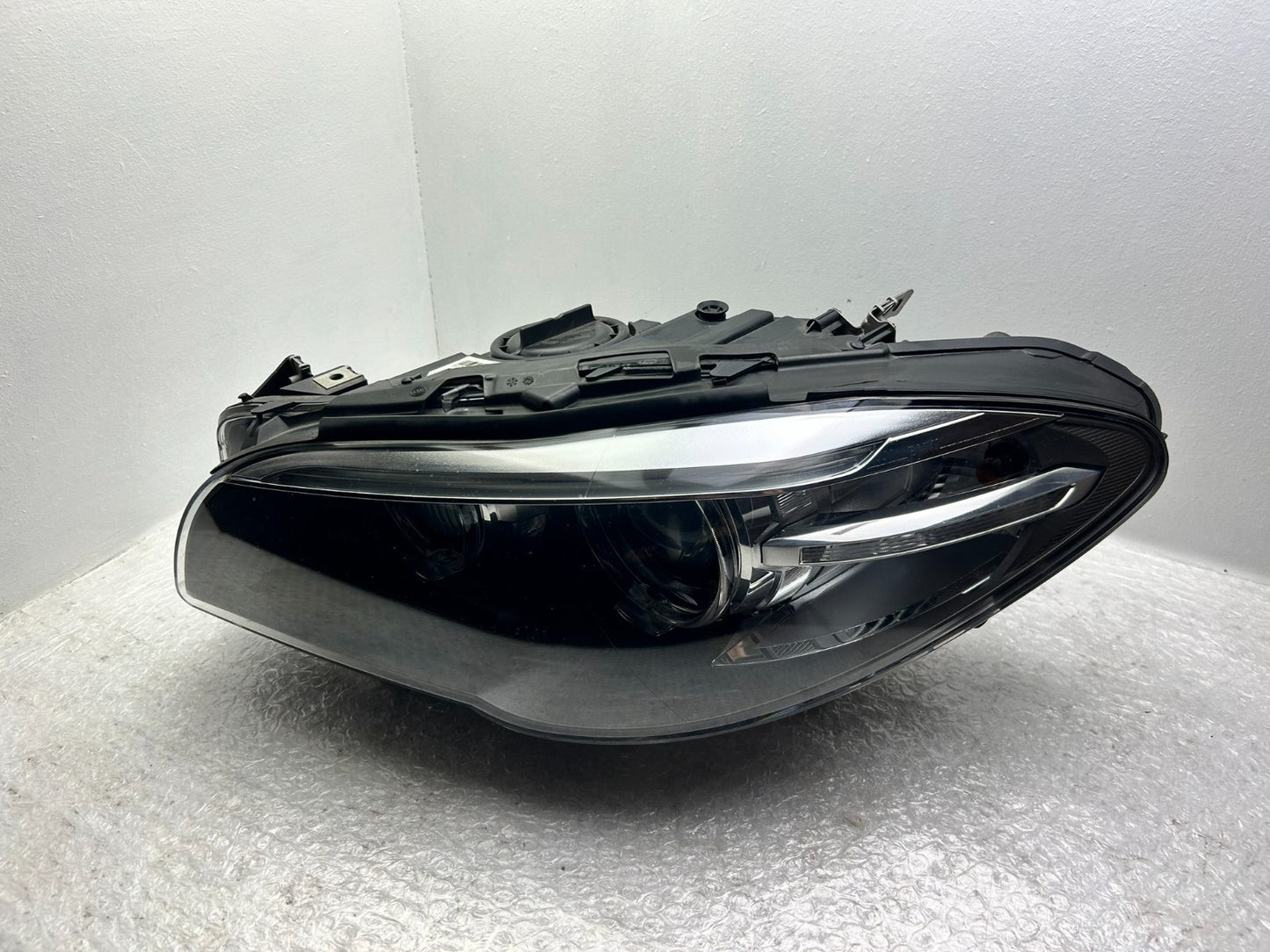 Original BMW 5er F10 F11 LCI Xenon Scheinwerfer links Kurvenlicht 74606010