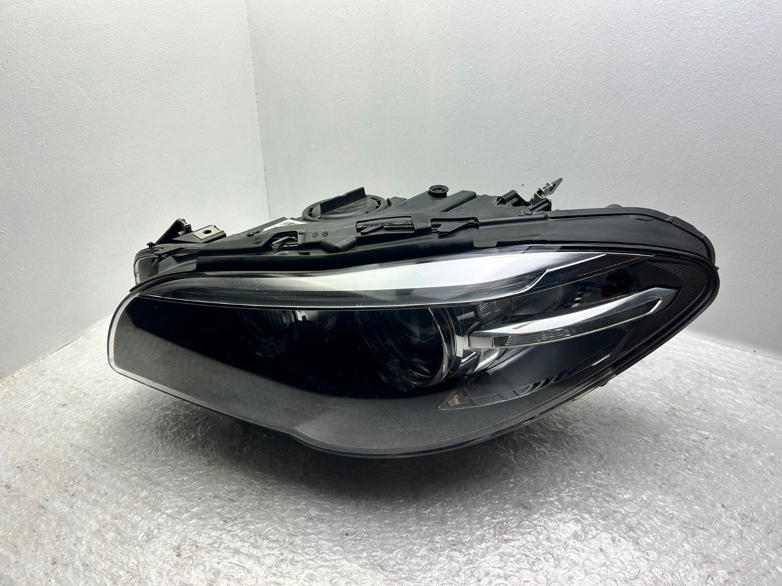 Original BMW 5er F10 F11 LCI Xenon Scheinwerfer links Kurvenlicht 74606010