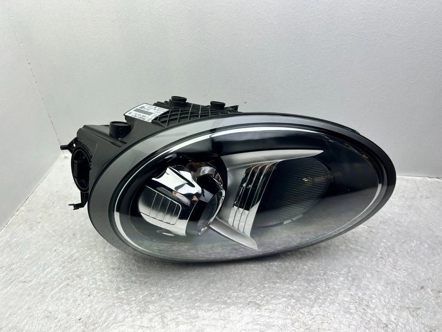 Porsche 911 991 Xenon Scheinwerfer links Kurvenlicht 99163113211
