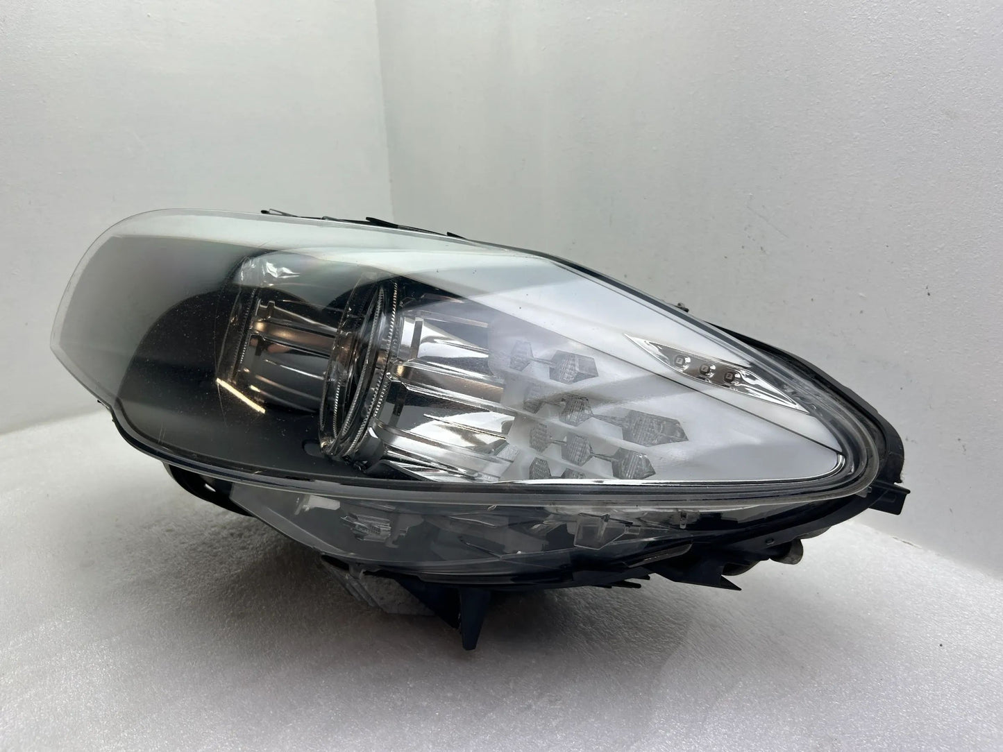 BMW 5er F10 F11 Xenon Kurvenlicht Scheinwerfer links 7203251