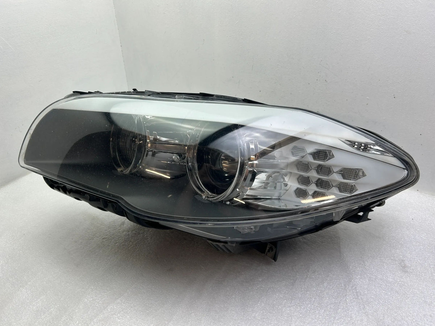 BMW 5er F10 F11 Xenon Kurvenlicht Scheinwerfer links 7203251