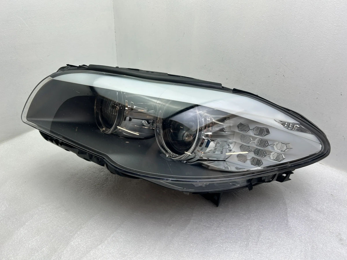 BMW 5er F10 F11 Xenon Kurvenlicht Scheinwerfer links 7203251