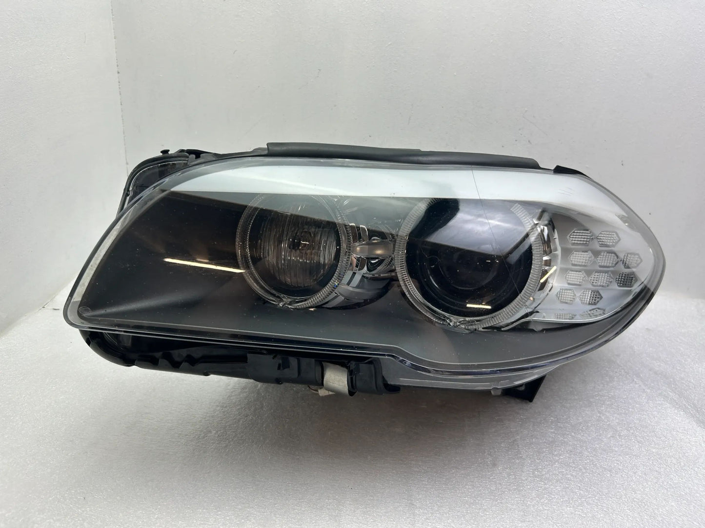 BMW 5er F10 F11 Xenon Kurvenlicht Scheinwerfer links 7203251